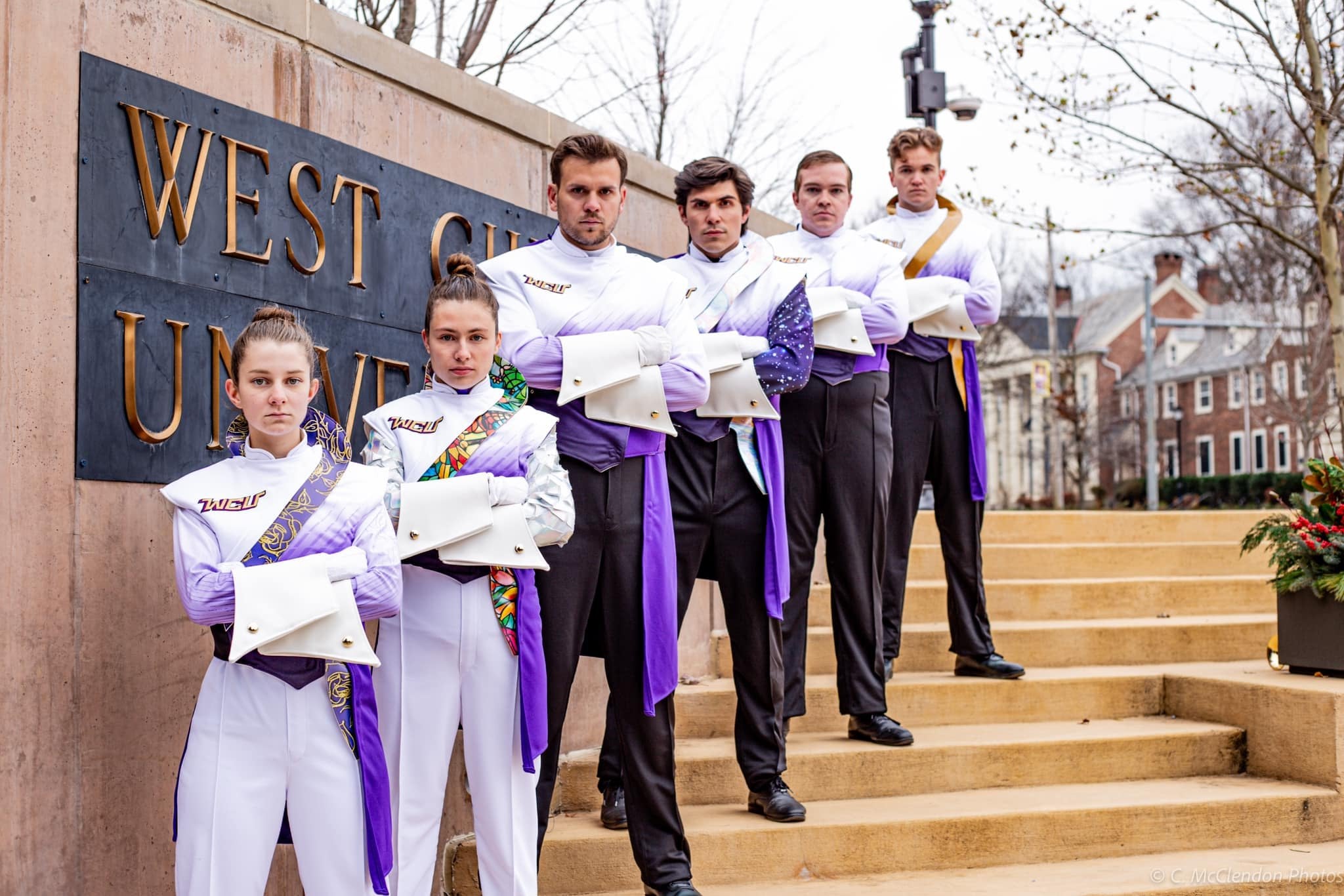 West Chester University custom band uniforms purple, black, and white